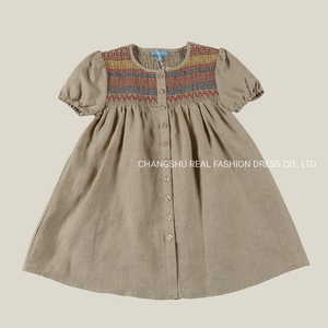 Toddle Children Clothing Girl Kids Woven Beige Dress Wear with Colorful Smoking Stitching